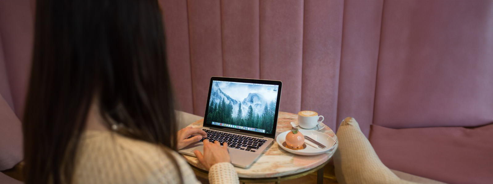 woman typing on computer